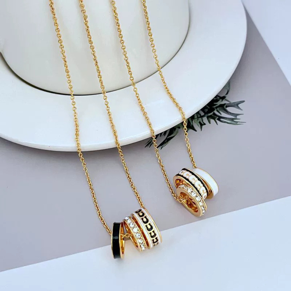 Coach Rhinestone Enamel Geometric Triple Ring Necklace